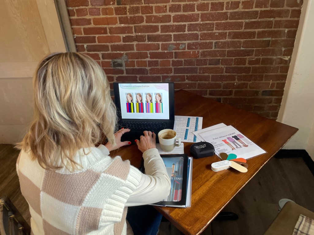 color and image consultant working in carson city, NV using a computer program to help determine your best colors that harmonize